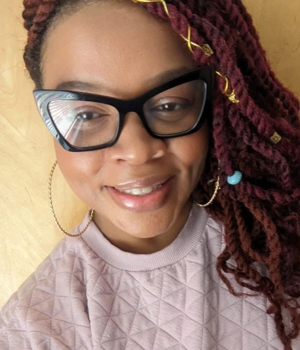 Leah, natural hair stylist, at Shack's Barber Shop
